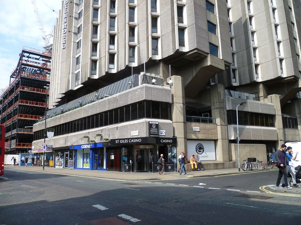 The St Giles building on Tottenham Court Road with the casino signage at street level